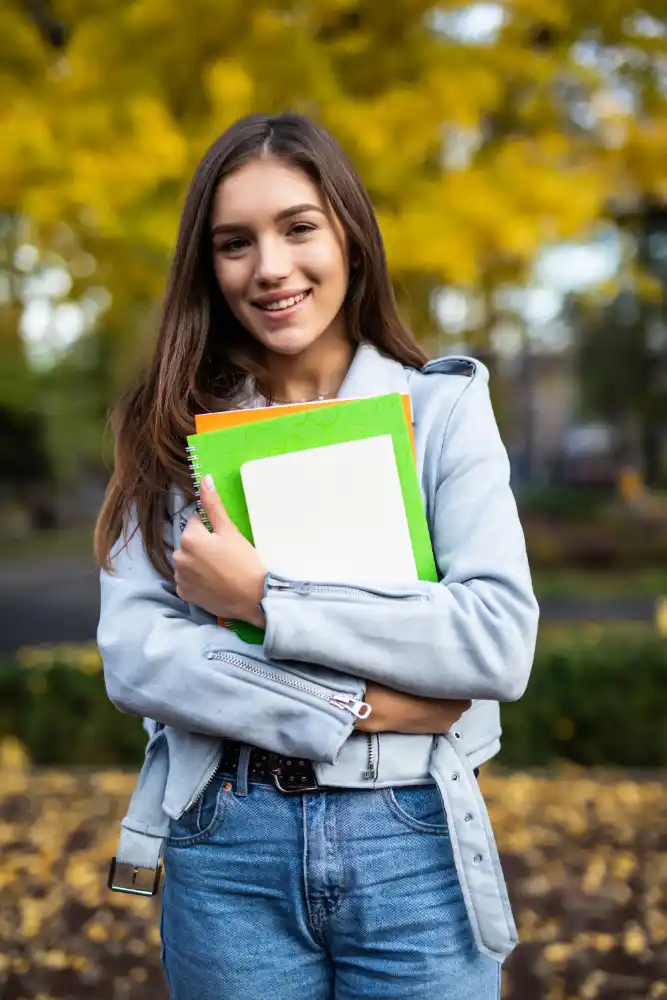 girl holding book